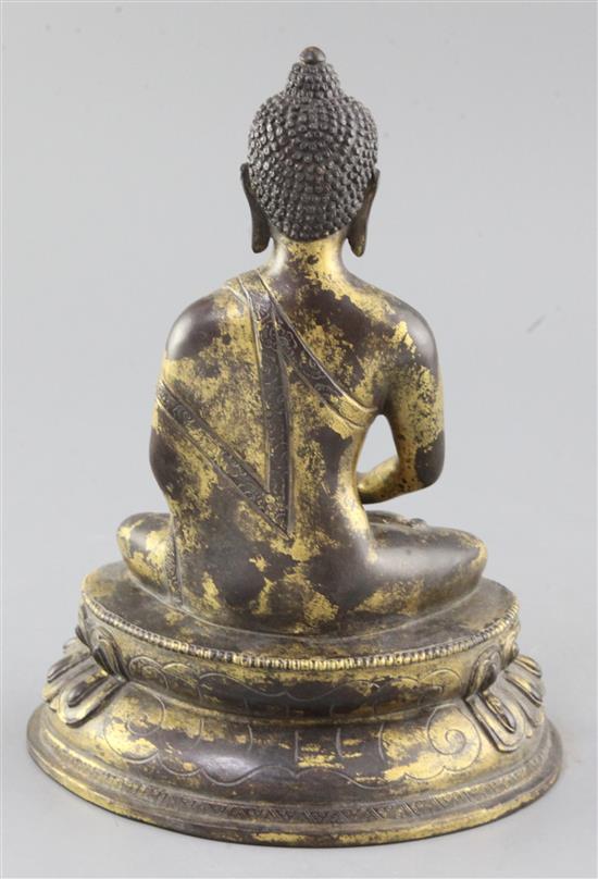 A Chinese gilt bronze seated figure of Buddha Shakyamuni, height 23cm